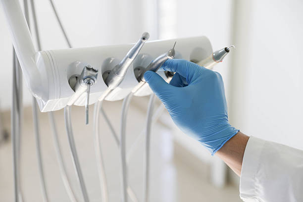 Professional Tooth Extraction technician working in Dover Base Housing, DE